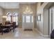 Welcoming foyer features tile flooring and transom window over front door at 1525 Gants Cir, Kissimmee, FL 34744