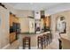 Modern kitchen with black granite countertops and breakfast bar at 1525 Gants Cir, Kissimmee, FL 34744
