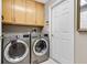 Laundry room featuring updated washer and dryer at 1525 Gants Cir, Kissimmee, FL 34744