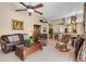 Large living room with tile floor, ceiling fan, furniture, and open layout at 1525 Gants Cir, Kissimmee, FL 34744