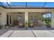 Covered patio with ceiling fan and comfortable wicker furniture, perfect for relaxing at 1525 Gants Cir, Kissimmee, FL 34744