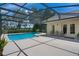 Inviting screened pool with a spacious deck for entertaining and enjoying the outdoors at 1525 Gants Cir, Kissimmee, FL 34744