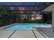 Sparkling pool with screened enclosure, offering privacy and an extended swimming season at 1525 Gants Cir, Kissimmee, FL 34744