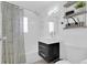 Updated bathroom showcasing a stylish vanity, toilet, and tub with showerhead at 1710 Thor Ave, Apopka, FL 32703