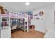 bedroom featuring a loft bed with workspace and playful decor at 1710 Thor Ave, Apopka, FL 32703