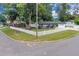 Corner lot home featuring well-kept lawn and manicured landscape at 1710 Thor Ave, Apopka, FL 32703