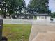 Charming one-story home with a white picket fence, healthy green lawn, and a welcoming front porch at 1710 Thor Ave, Apopka, FL 32703