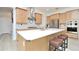 Modern kitchen with a large island, stainless steel appliances, and ample cabinetry at 1855 Treasure Cv, Kissimmee, FL 34747