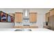 Stylish kitchen with stainless steel appliances, quartz countertops, and ample cabinet space at 1855 Treasure Cv, Kissimmee, FL 34747