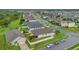 An aerial view of a well-planned neighborhood with solar panels and manicured lawns at 1864 Castleton Dr, St Cloud, FL 34771