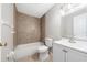 Clean bathroom with tiled shower-tub combo and modern vanity at 1891 Caralee Blvd # 3, Orlando, FL 32822