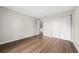 Bedroom with hardwood floors and closet space at 1891 Caralee Blvd # 3, Orlando, FL 32822