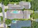 Aerial view of property with a pool and landscaped backyard at 205 N Village St, Celebration, FL 34747