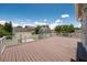 Spacious deck perfect for entertaining with surrounding trees and bright blue skies at 205 N Village St, Celebration, FL 34747