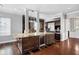 Gourmet kitchen featuring a large island, stainless steel appliances, and custom cabinetry for a luxurious cooking experience at 205 N Village St, Celebration, FL 34747