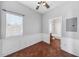 Sitting room with wainscotting, brick-like floors, and view into updated bathroom at 205 N Village St, Celebration, FL 34747