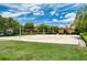 Community sand volleyball court with lush green surroundings at 205 N Village St, Celebration, FL 34747