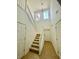 Bright foyer with high ceilings and a staircase leading to the second floor at 2243 Seven Oaks Dr, St Cloud, FL 34772