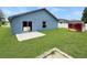 Well-maintained backyard featuring a concrete patio and shed at 2444 Oak Mill Dr, Kissimmee, FL 34744