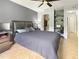 Spacious bedroom with tile floor, closet, and a computer desk at 2444 Oak Mill Dr, Kissimmee, FL 34744