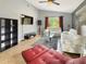 Inviting living room with tile flooring, comfortable seating, and ample space for entertaining at 2444 Oak Mill Dr, Kissimmee, FL 34744