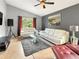 A sunlit living room featuring a modern sofa set, stylish decor, and a relaxing atmosphere at 2444 Oak Mill Dr, Kissimmee, FL 34744