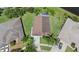 Aerial view of a residential property showcasing the layout and landscaping at 2612 Keswick Ct, Kissimmee, FL 34744