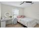 Charming bedroom with a vanity and natural light at 2612 Keswick Ct, Kissimmee, FL 34744