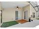 Covered patio features ceiling fan, sliding glass doors, and an outdoor area at 2612 Keswick Ct, Kissimmee, FL 34744