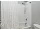 Bathroom featuring a white tub/shower with a showerhead and simple, clean design at 267 Goldenrain Dr # 30, Celebration, FL 34747