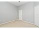 Neutral bedroom with carpet flooring and a closet; a comfortable and functional space at 267 Goldenrain Dr # 30, Celebration, FL 34747