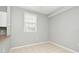 Cozy dining area features tile flooring and a window for natural light at 267 Goldenrain Dr # 30, Celebration, FL 34747