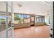 Enclosed patio with tile flooring offering plenty of sunlight and views of the backyard at 2695 Hilliard Ct, Kissimmee, FL 34744