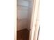 A small closet with metal shelving at 3036 S Semoran Blvd # S, Orlando, FL 32822