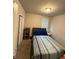 Inviting bedroom featuring carpeted floors, ample natural light, and a comfortable atmosphere at 3342 Curlew Ave, Leesburg, FL 34748
