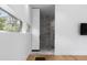 Bright bathroom with a window, a marble shower, and a sleek design at 3807 S Semoran Blvd, Orlando, FL 32822