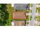 Aerial view of house showing backyard, roof, and lawn at 3837 Carrick Bend Dr, Kissimmee, FL 34746