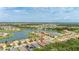 Beautiful homes line the waterways of this lakeside community that features mature trees and well-maintained lawns at 3837 Carrick Bend Dr, Kissimmee, FL 34746