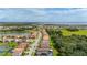 A beautiful subdivision next to a lake and lush green space filled with trees and winding canals at 3837 Carrick Bend Dr, Kissimmee, FL 34746