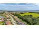 A beautiful subdivision next to a lake and lush green space filled with trees and winding canals at 3837 Carrick Bend Dr, Kissimmee, FL 34746