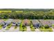 Charming single-story home with a tile roof, well-manicured lawn, and a beautiful tree-lined backdrop at 3837 Carrick Bend Dr, Kissimmee, FL 34746