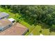 Spacious backyard featuring lush green grass and a defined border, ideal for outdoor activities at 3837 Carrick Bend Dr, Kissimmee, FL 34746