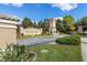 Welcoming community entrance with 'Bellalago' sign, architectural tower, and lush landscaping at 3837 Carrick Bend Dr, Kissimmee, FL 34746