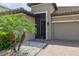 Inviting exterior with a tile roof, well-maintained lawn, and a paved walkway to the entrance at 3837 Carrick Bend Dr, Kissimmee, FL 34746
