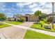 A home in an attractive neighborhood with manicured lawns and tree lined streets at 3837 Carrick Bend Dr, Kissimmee, FL 34746