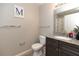 Bathroom with a granite countertop and a toilet at 4008 San Sebastian Dr # 105, Kissimmee, FL 34741