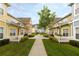 Colorful community with manicured lawns and sidewalks creating a pleasant and walkable neighborhood environment at 4008 San Sebastian Dr # 105, Kissimmee, FL 34741