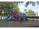 Community playground featuring colorful slides, climbing structures, and safety features, providing a fun recreation area at 4008 San Sebastian Dr # 105, Kissimmee, FL 34741
