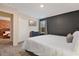 Modern bedroom offering a king size bed and calming decor at 4547 Narrative Ln, Kissimmee, FL 34746
