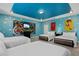 The will love this bedroom with Toy Story themed decor and three beds at 4547 Narrative Ln, Kissimmee, FL 34746